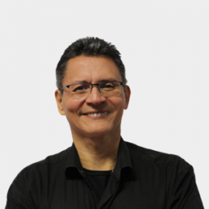 The photo was taken in close-up, with a white background, and the professor Fabian Alberto Rueda is situated in the center.