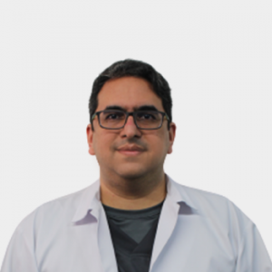The photo was taken in foreground, white background and Professor Gustavo Adolfo Contreras García is located in the center.