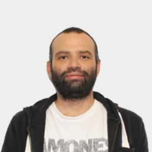 The photo was taken in the foreground, white background and the professor Jhon Fredy Pérez Torres is located in the center.