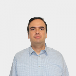 The photo was taken in the foreground, white background and the professor Sergio Andres Marchant Rojas is located in the center.