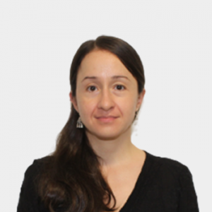 The photo was taken in the foreground, white background and the professor Verónica García Rojas is located in the center.