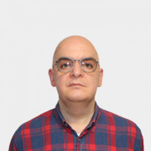 The photo was taken in the foreground, white background and the professor Markus Hans Oliver Doerr is located in the center.