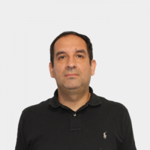 The photo was taken in the foreground, white background and the professor Jhon Jairo Castillo León is located in the center.