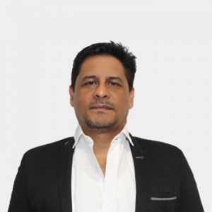 The photo was taken in the foreground, white background and the professor Nelson Facunmdo Rodríguez López is located in the center.