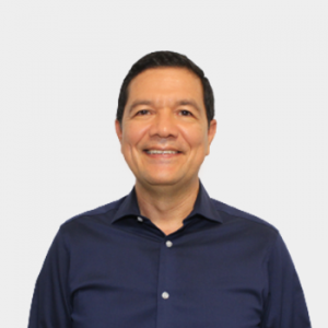 The photo was taken in the foreground, white background and the professor Daniel Ricardo Molina Velasco is located in the center.