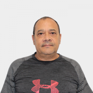 The photo was taken in the foreground, white background and the professor Herminsul de Jesús Cano Calle is located in the center.