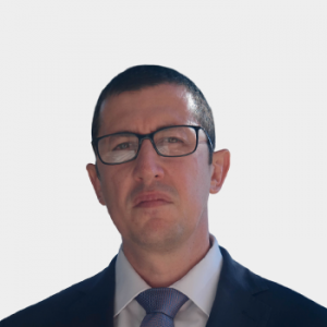 The photo was taken in close-up, with a white background, and the professor Pedro Jose Díaz Guerrero is positioned in the center.