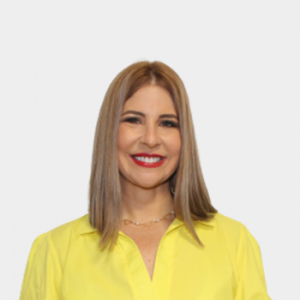 The photo was taken in the foreground, white background and Professor Sonia Cristina Gamboa, is located in the center.
