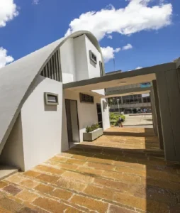 Photograph of the School's auditorium façade.