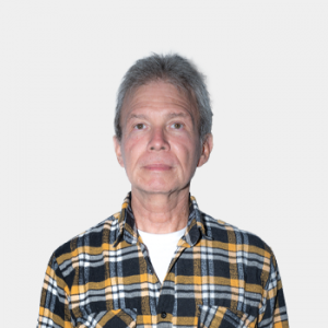 The photo was taken in close-up, with a white background, and the professor Jaime Guillermo Barrero Pérez is positioned in the center.