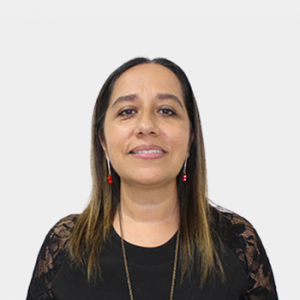 The photo was taken in the foreground, white background and Professor Aurora Inés Gáfaro Rojas is located in the center.