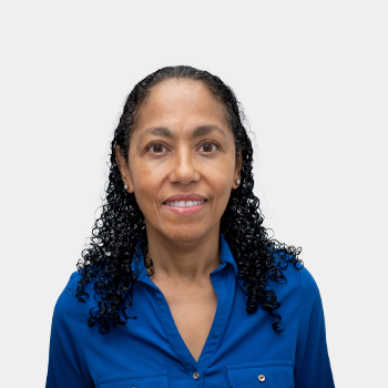 The photo was taken in the foreground, white background and Professor Elcy Maria Cordoba is located in the centre.