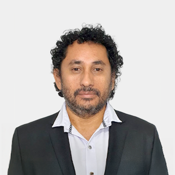 The photo was taken in the foreground, white background and Professor Victor Gabriel Baldovino Medrano is located in the centre.