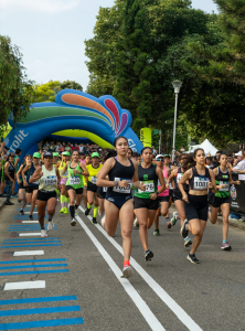 Women jogging on the track lane