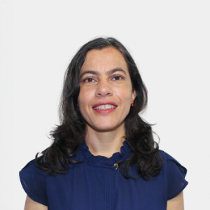 The photo was taken in close-up, on a white background, with the professor Brenda Escobar Guzman positioned in the center.