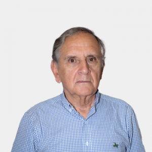 The photo was taken in the foreground, white background and the professor is located in the center.