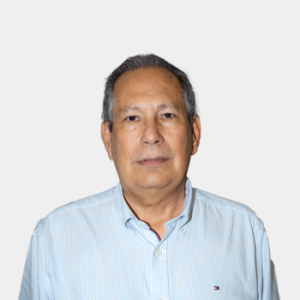 The photo was taken in the foreground, white background and the professor is located in the center.