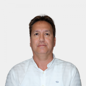 The photo was taken in the foreground, white background and the professor is located in the center.