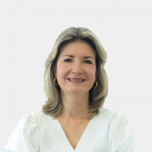 The photo was taken in the foreground, white background and Professor Olga Mercedes Alvarez, is located in the center.