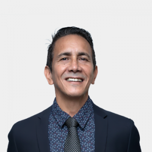 The photo was taken in foreground, white background and Professor Oscar Vanegas Angarita is located in the center.