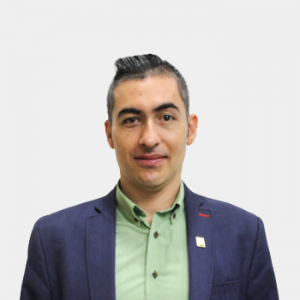 The photo was taken in the foreground, white background and Professor Robinson Giraldo Villegas is located in the centre.