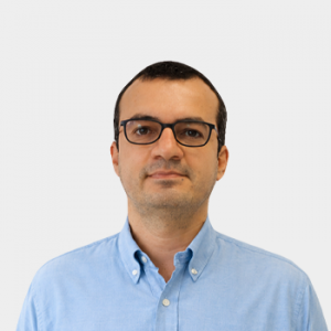 Photo in foreground; professor Cesar Duarte centered with a white background.