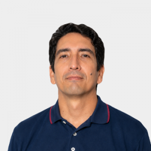 Photo in foreground; professor omar Tíjaro centered with a white background.
