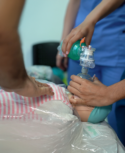 Student learning pediatric care techniques