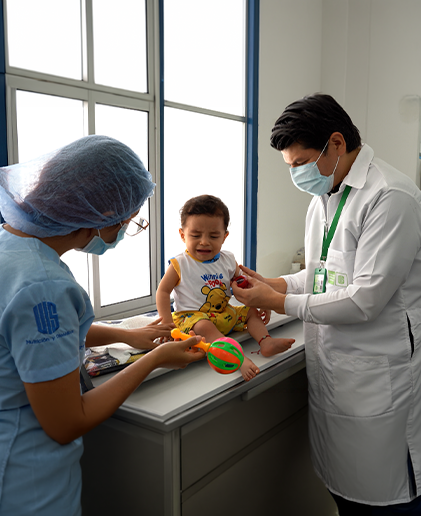 Student and instructor working with a child